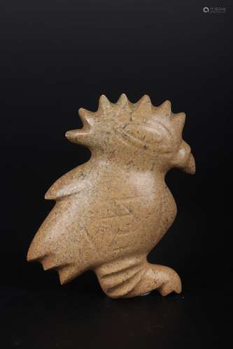 A CARVED JADE FIGURE OF BIRD