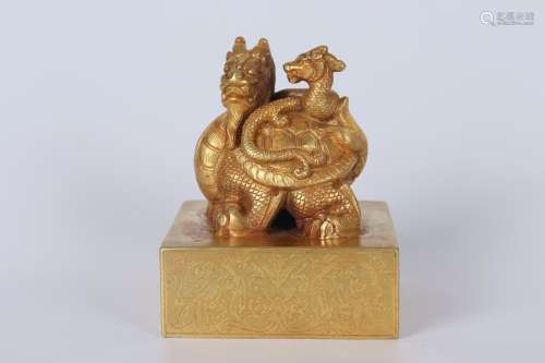 A GILT BRONZE MYTHICAL BEAST SEAL