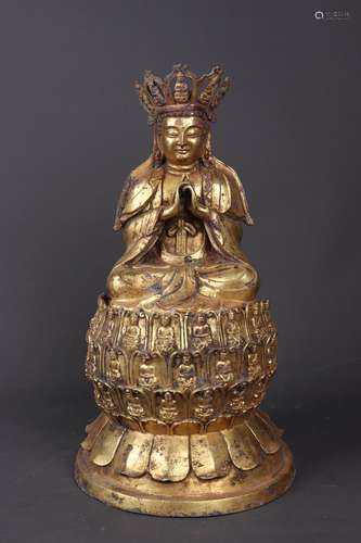 A GILT BRONZE FIGURE OF BUDDHA