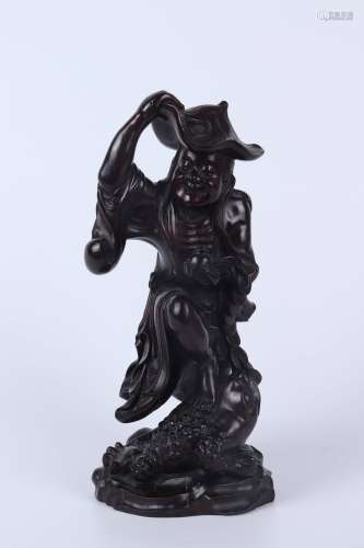 A CARVED SANDALWOOD FIGURE OF LIUHAI AND HIS TOAD
