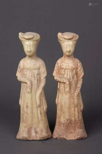 A PAIR OF CARVED POTTERY FIGURES OF FEMALE ATTENDANT