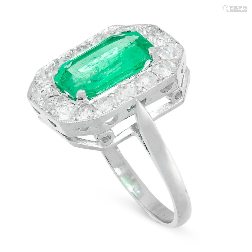 A COLOMBIAN EMERALD AND DIAMOND RING set with an