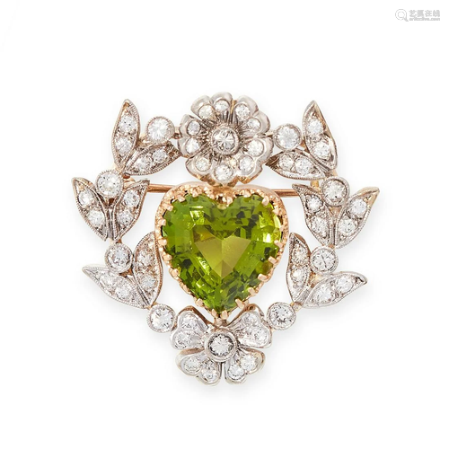 A PERIDOT AND DIAMOND PENDANT / BROOCH in yellow gold