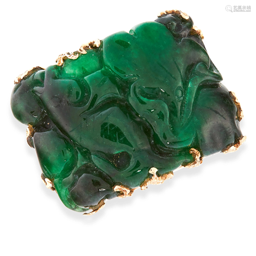 A CARVED JADEITE JADE COCKTAIL RING in high carat