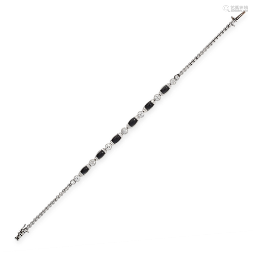 AN ONYX AND DIAMOND BRACELET set with a single row of