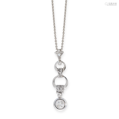 A DIAMOND PENDANT NECKLACE set with a row of old cut,