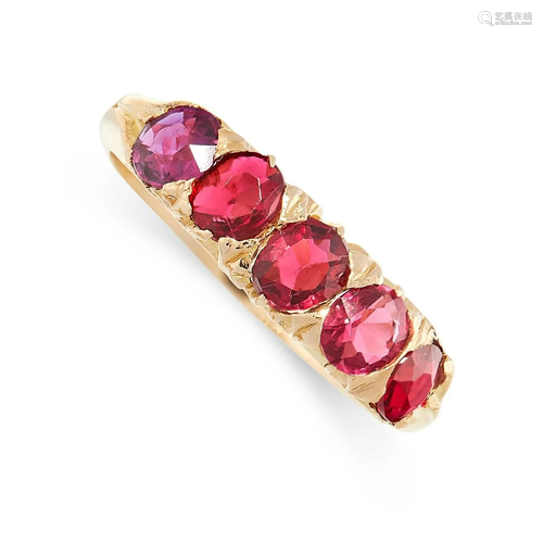 A RUBY FIVE STONE RING in yellow gold, set with five