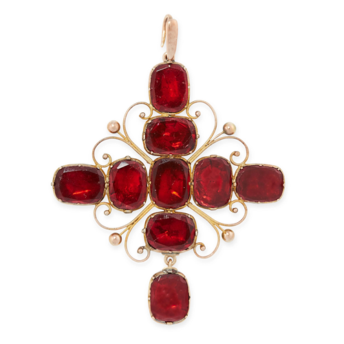 AN ANTIQUE GARNET CROSS PENDANT in yellow gold, set