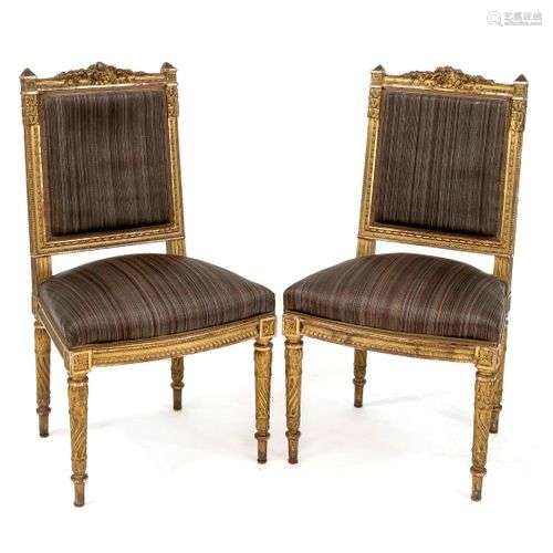 Pair of chairs in classicist style around 1880, carved and g...