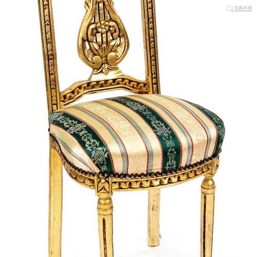 Elegant chair, 20th century, empire form, wood carved gilded...