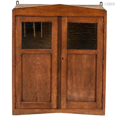 Hanging cabinet,1920s, solid oak, 87 x 70 x 35 cm.- The furn...