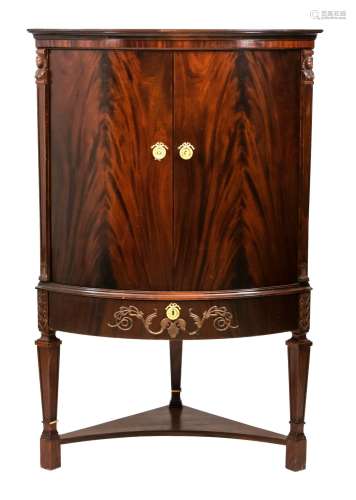 Empire style corner cabinet, 20th c., mahogany, slightly bul...