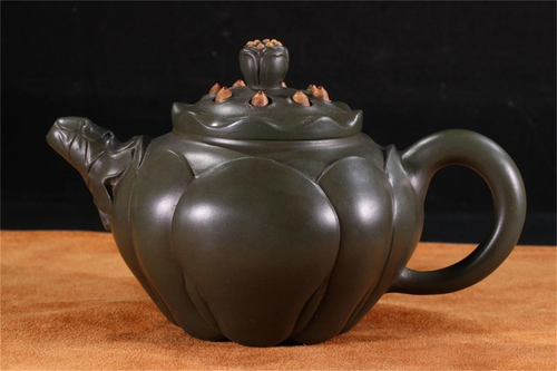 A Carved Yixing Clay Lotus Shaped Teapot