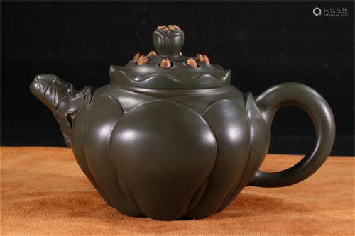 A Carved Yixing Clay Lotus Shaped Teapot