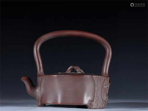 A Carved Yixing Zisha Teapot