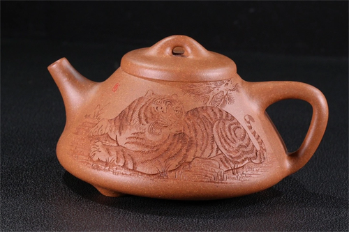 A Carved Yixing Clay Teapot