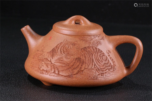 A Carved Yixing Clay Teapot