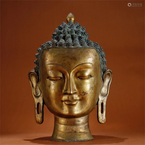 A Gilt Bronze Buddha Head