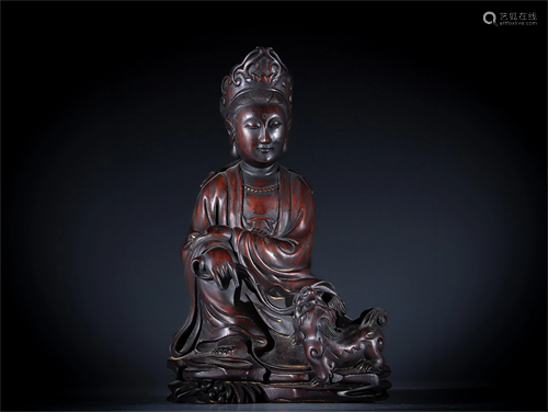 A Carved Zitan Wood Guanyin Statue