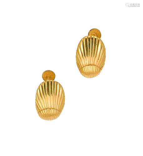 A pair of decorative stylized shell ear studs,