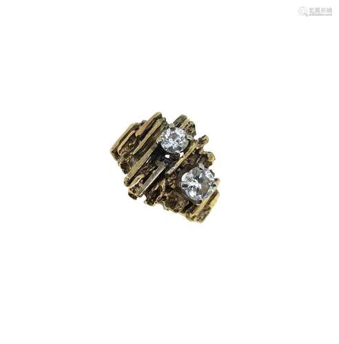 A late 20th century two stone diamond ring,