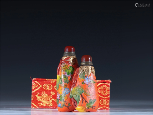 A Carved Peking Glass Snuff Bottle