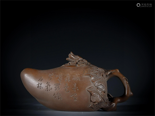 A Carved Yixing Zisha Teapot with Calligraphy