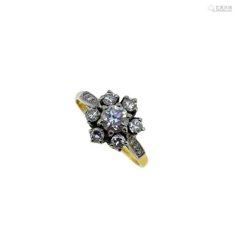 A diamond cluster ring set in 18ct gold,