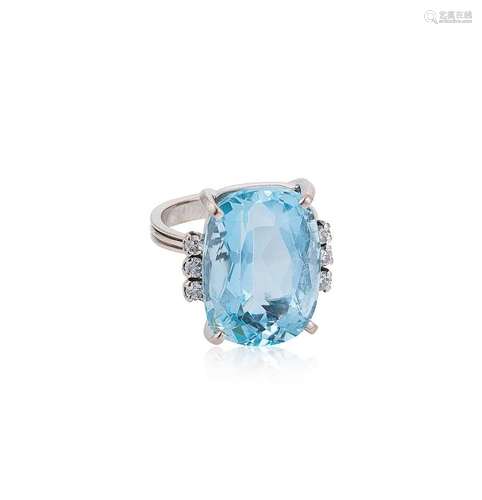 A modern aquamarine and diamond set cocktail ring,