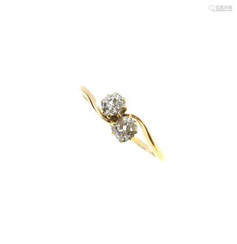 A two stone diamond crossover style ring,