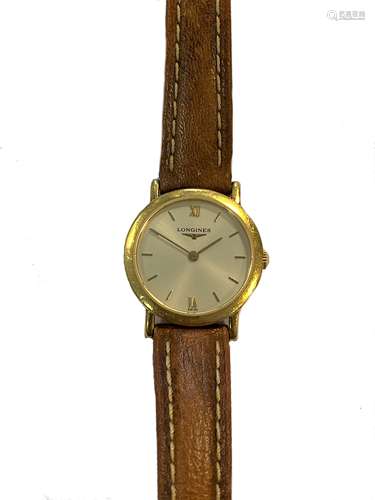 Longines - A lady's 18ct gold wristwatch,