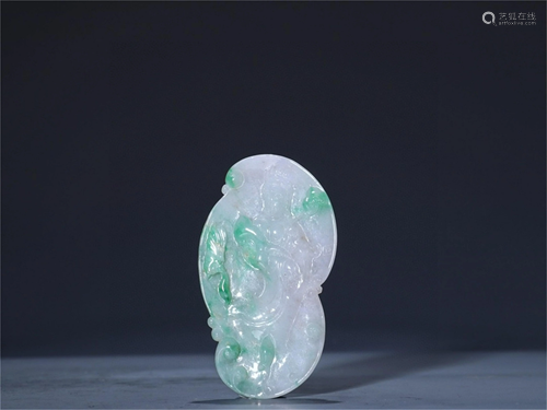 A Carved Jadeite Pendant