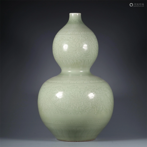 A Celadon Glazed Gourd Shaped Vase