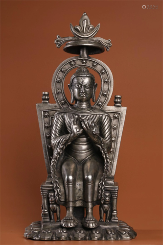 A Silver Buddha Statue