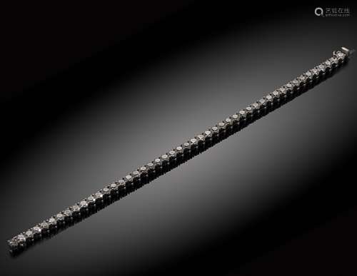 An important diamond line bracelet,