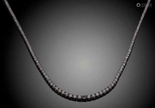 A graduated diamond rivière necklet,