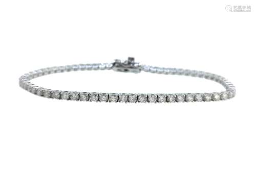 A 9ct white gold diamond line bracelet,