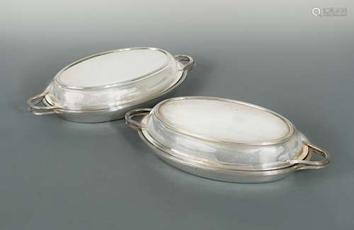 A pair of George V silver covered vegetable dishes,