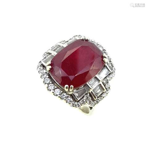 An 18ct gold ruby and diamond cluster ring,