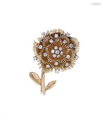 A diamond set flower pendant/brooch,