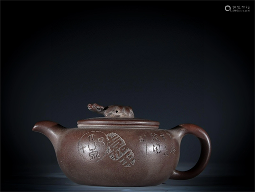 A Carved Yixing Zisha Teapot with Calligraphy