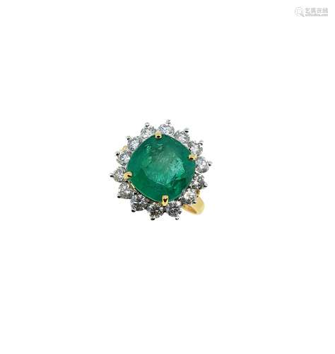 An emerald and diamond cluster ring,