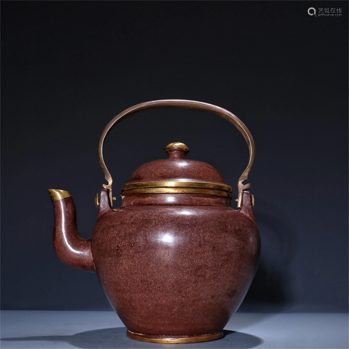 A Yixing Zisha Teapot with Handle