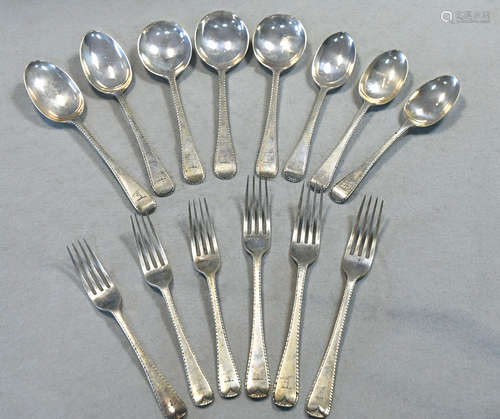 A 14 piece set of George V silver flatware,