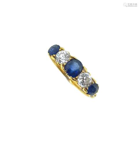 A Victorian sapphire and diamond five stone carved head styl...