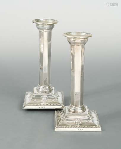 A pair of Edward VII silver candlesticks, mark of Liberty & ...