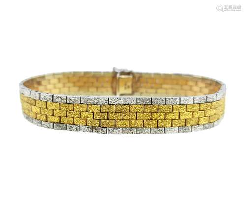 A late 20th century two colour gold brick link bracelet,