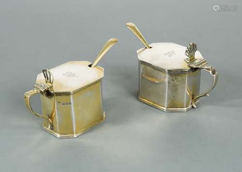 A near pair of George V silver gilt mustards,