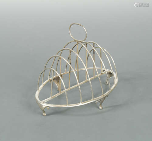 A George III 18th century silver seven bar toast rack,