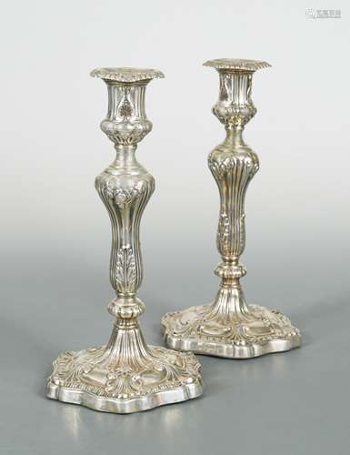 A pair of George III silver candlesticks,